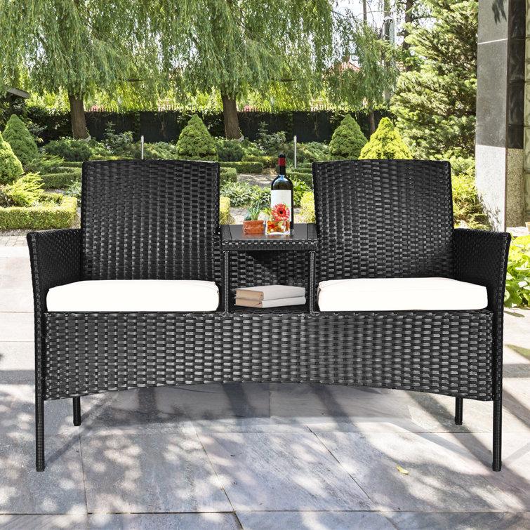 Winston Porter Baller 54.5'' Wide Outdoor Wicker Loveseat with Cushions